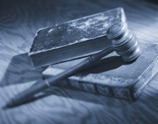 image of a gavel on top of a book